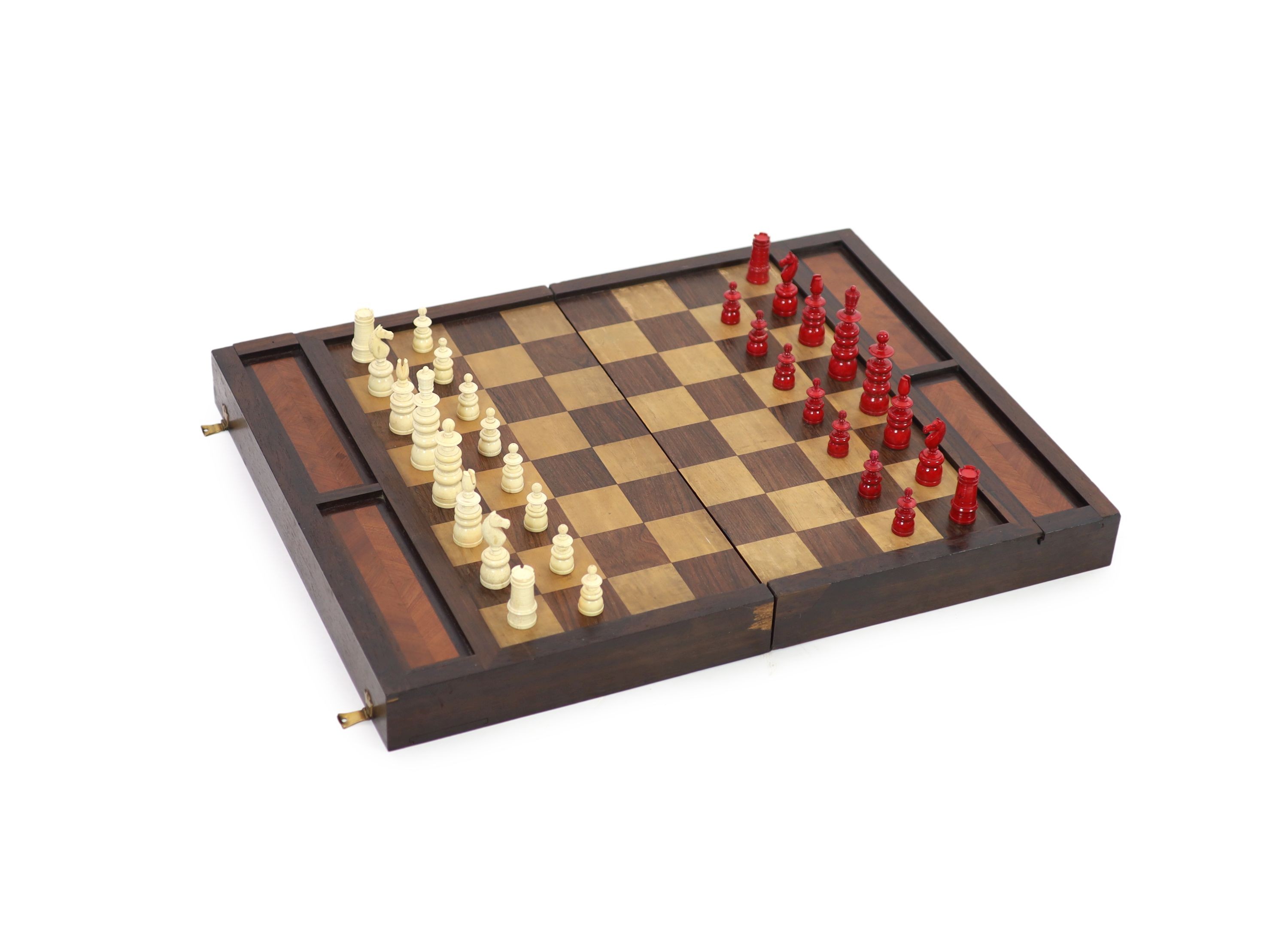 An early 20th century rosewood folding games board, external chess and internal backgammon, W 75cm D 56cm when open, W 75cm D 37cm when closed